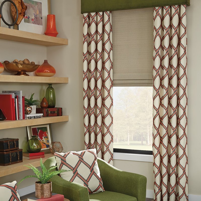 Custom Horizons natural woven shades and drapery displayed in a modern living room with large bay windows.